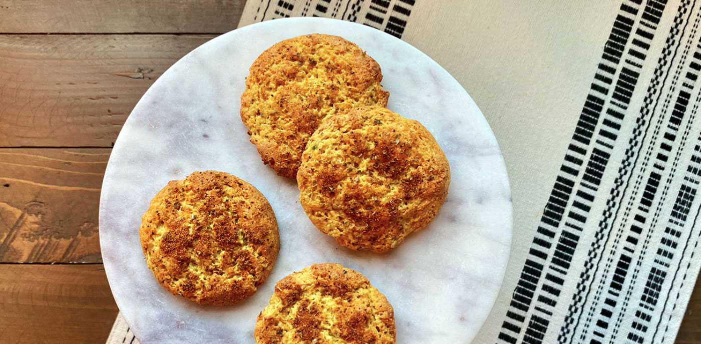 Biscuits on marble plate and wood table.