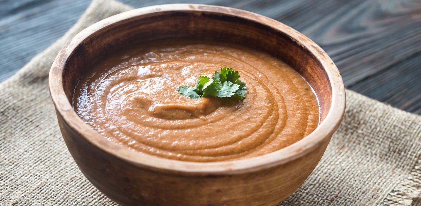 Wooden bowl filled with Seafood Bisque