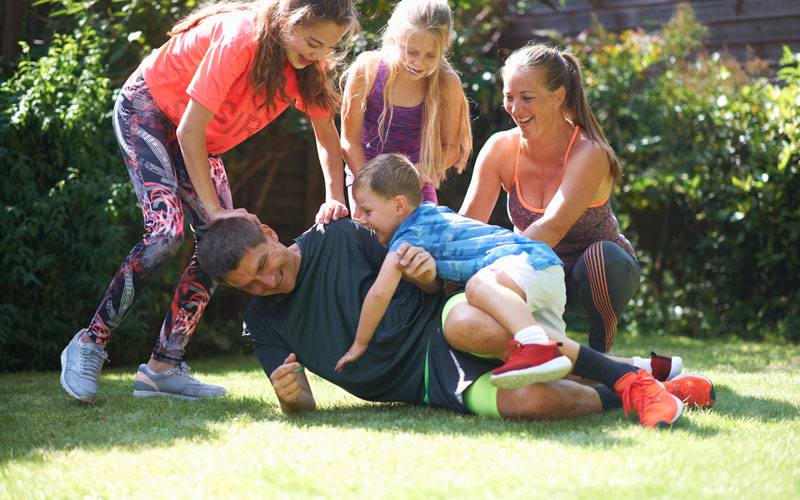 family-playing-in-garden_web