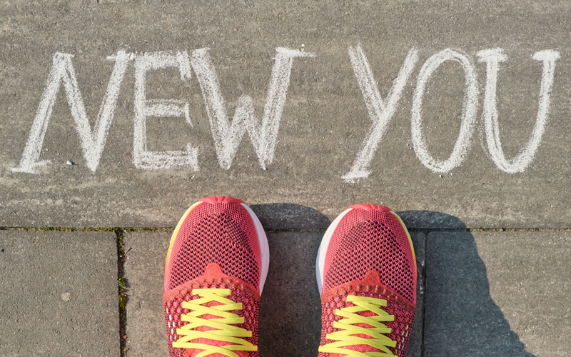 text-new-you-written-on-gray-sidewalk-with-women_web